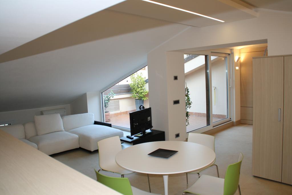 Apartamento La Terrazza Sull'Arena Verona Habitación foto
